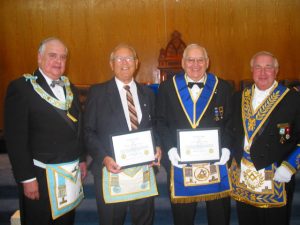 September - The Worshipful Master and D.D.G.M. presented a 50 year service certificate and pin to Bro. Bill Groom and a 25 year service certificate and pin to V.W. Bro. Fleming.