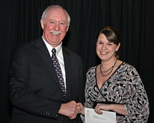 Presentation of the Nickel Lodge Bursary at Cambrian College. Our Worshipful Master - W. Bro. George Nichols presents our bursary to Ms. Stacy Sutton.
