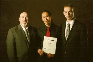 On April 18th at Cambrian College. Bro. Thomas King, Senior Warden (on left) and W. Bro. Stephen Fleming presented Mr. Evan Abitong with the Nickel Lodge Bursary for 2013.