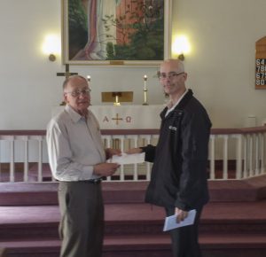 Food Bank presentation on behalf of Nickel Lodge. Our Junior Warden, Bro. John Reynolds presented $534.40 to the Parish of St. Mathews and St. Timothys on behalf of the Lodge, collected over twelve months at light lunches following meetings.