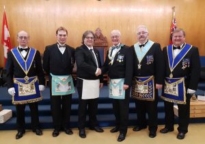 Bro. Ghislain Cotton affiliated with Nickel Lodge. L to r: V.W. Bro. Gary R. Cayen, GJD; W. Bro. Stephen Fleming, sponsor; Bro. Ghislain Cotton; WM R.W. Bro. J. David Innes; R.W. Bro. Robert Fleming, sponsor; V.W. Bro. Reijo A. Luoma, Grand Steward.