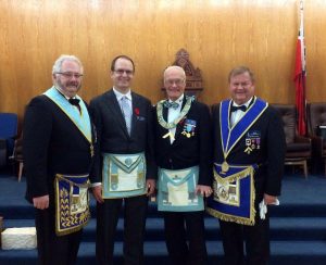 At the Regular Meeting in November. L to r: Sponsor R.W. Bro. Robert J. Fleming, newly Raised Bro. David Gillingham, Sponsor/WM R.W. Bro. J. David Innes, Grand Steward V.W. Bro. Reijo A. Luoma.
