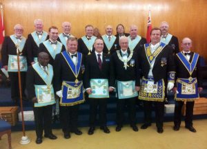 W. Bro. Richard England led a Team of Past Masters on October 5th in the Raising of Bro. Jordan Douglas. Front row: W. Bro. Doumerge Horace, V.W. Bro. Reijo Luoma, Bro. Jordan Douglas, WM R.W. Bro. J. David Innes, DDGM R.W. Bro. Jason B. Ashley, GJD V.W. Bro. Gary R. Cayen. Back row: W. Bro. Kenneth Alexander, W. Bro. Gregory Newson, W. Bro. Stephen Fleming, W. Bro. George Nichols, W. Bro. Paavo Liukko, W. Bro. Tom King, W. Bro. Richard England, W. Bro. Brian Howe, R.W. Bro. Robert J. Fleming.