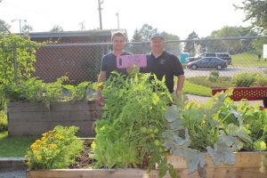 Nickel Lodge's 300 year Anniversary project. In 2017, Bro. John Leonard (right) with Bro. Angus Morris (left) bought a $100 community group garden bed in the name of Nickel Lodge at the Westmount Community Center. Harvest items like zucchini, radishes and lettuce were donated to the Blue Door Soup Kitchen.